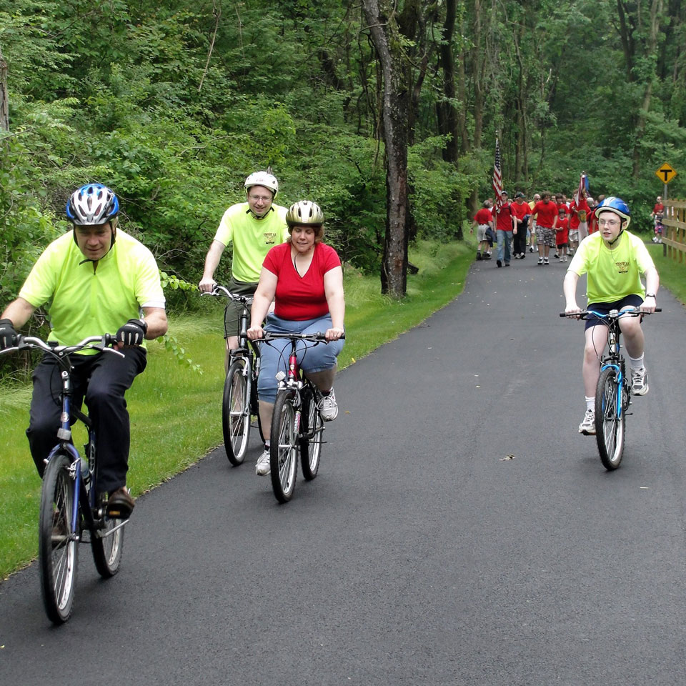 A group of Cycling enthusiasts biking on trail